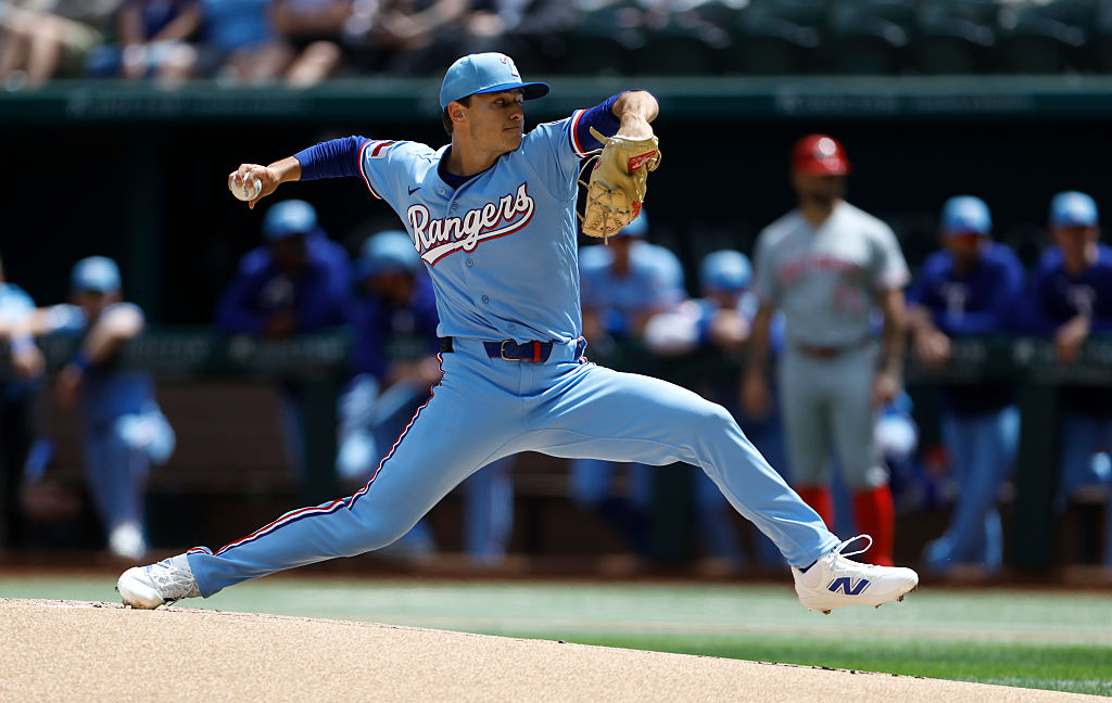 ARLINGTON, TEXAS - APRIL 5: Jack Leiter #22 of the Texas Rangers pitches against the Cincinnati Reds during the second inning at Globe Life Field on April 5, 2026 in Arlington, Texas. (Photo by Ron Jenkins/Getty Images)