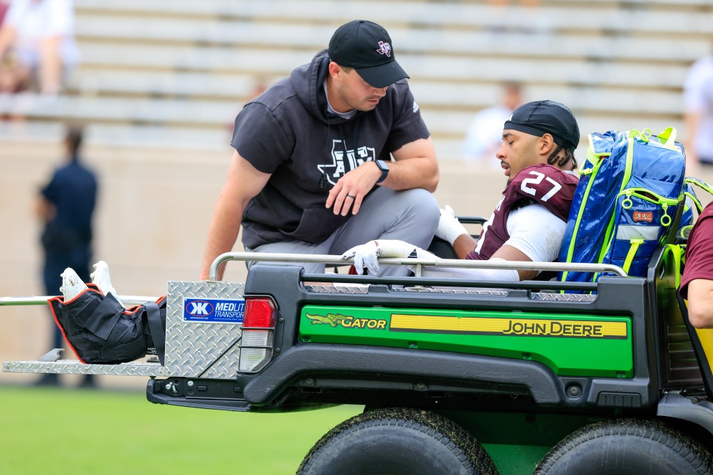 Texas A&M Aggies linebacker Daymion Sanford #27 gets carted off the field during the Maroon and White game on April 18, 2026, at Kyle Stadium in College Station, TX.(