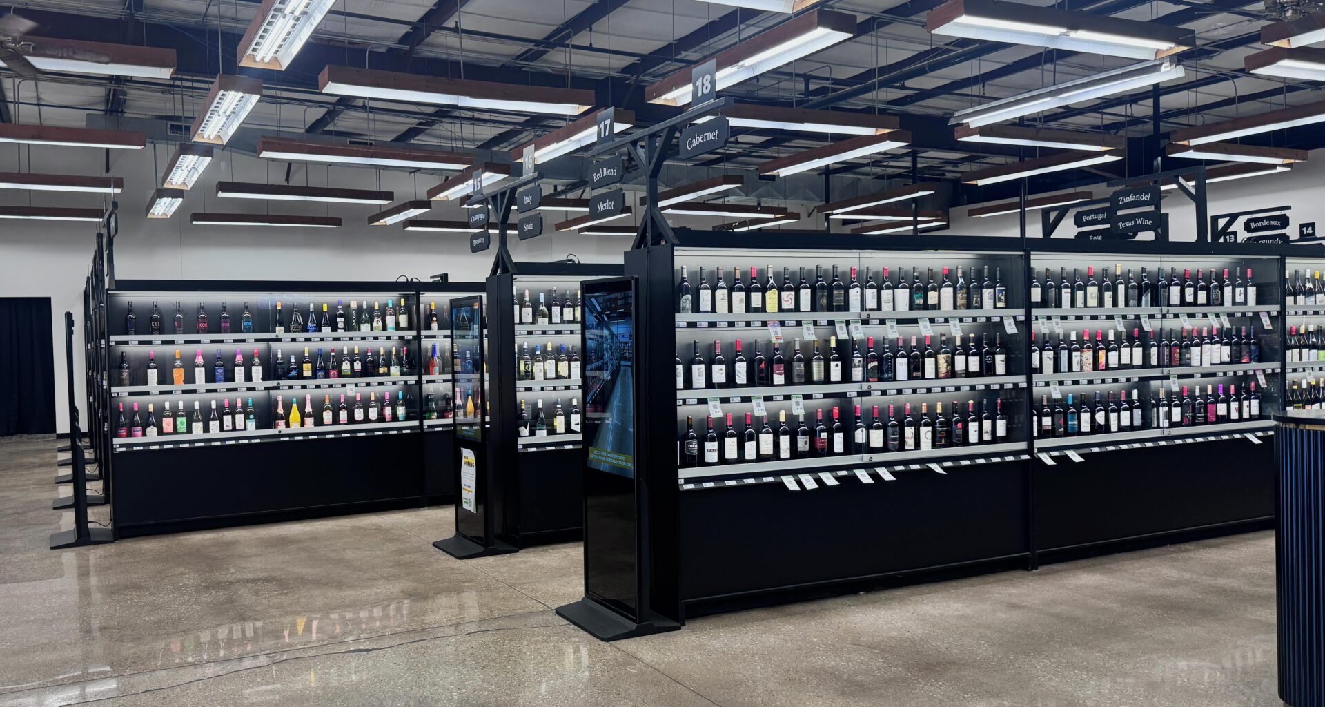 Remolded liquor shelves at Goody Goody that look sort of like a vending machine.