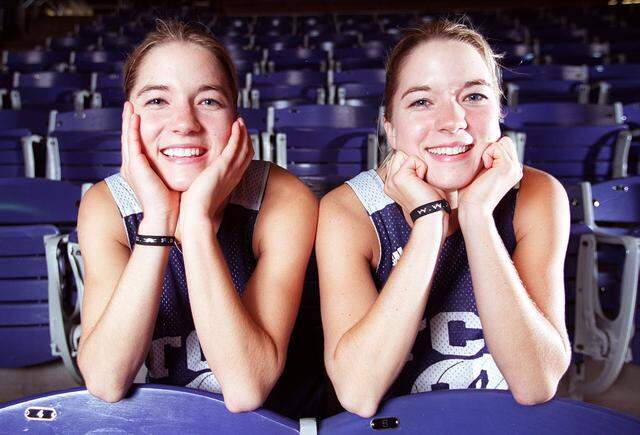 Nov. 10, 1999: Amy and Jill Sutton, twins of the TCU women's basketball team, have their picture taken at Daniel Meyer Coliseum.