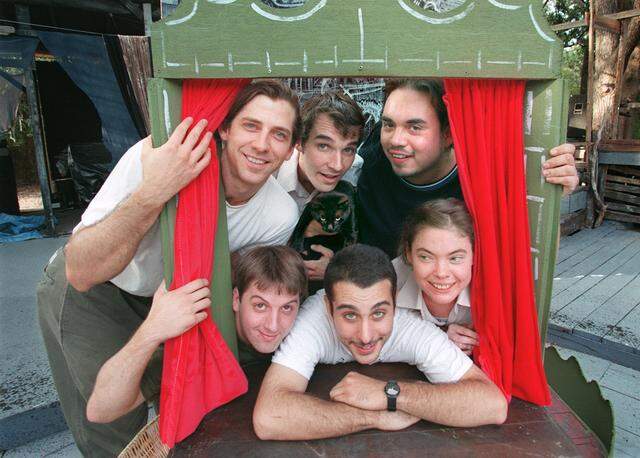 Sept. 12, 1999: A group of young active actors/playwrights/directors in the Fort Worth theater community. From left, bottom, Lane Pianta, Harold Lehmann, Lake Simons. Top from left, Peter Hargrave, Cole Spivey, Rob Bosquez. The cat in center is the theater cat named Katmandu. They are posing at Hip Pocket Theatre at Oak Acres Amphitheatre on Las Vegas Trail.