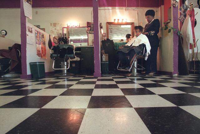 Dec. 20, 1999: Idar Wilkinson, right, has done her granddaughter Keshia Fields’ hair for all of her 13 years at Ida's Fashionaire Beauty Salon in Stop Six in Fort Worth. After 46 years, Wilkinson is closing the doors of her salon on Christmas Eve.