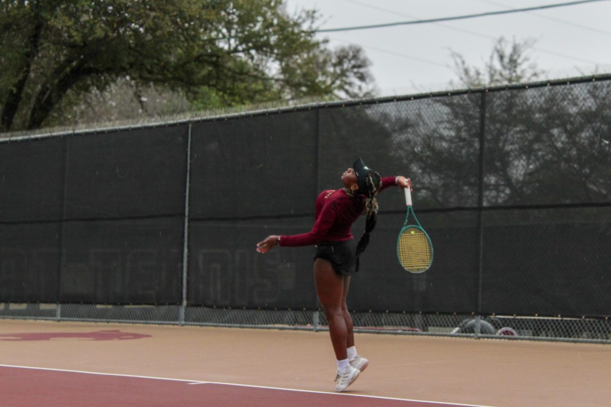 Texas State sophomore Chantajah Mills serves during her doubles match with Tadiwanashe Mauchi against Incarnate Word, Sunday, March 8, 2026, at the Bobcat Tennis Complex.