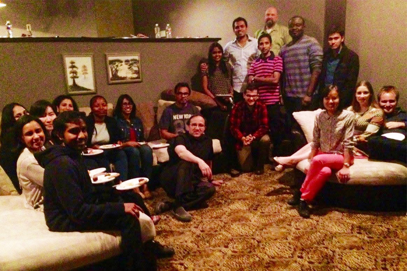 Dhurandhar and Bailey among a large group of students.