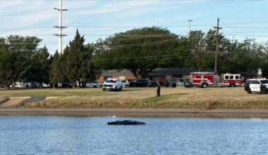 Emergency crews rescue person trapped inside vehicle submerged in playa lake near 56th and Bangor
