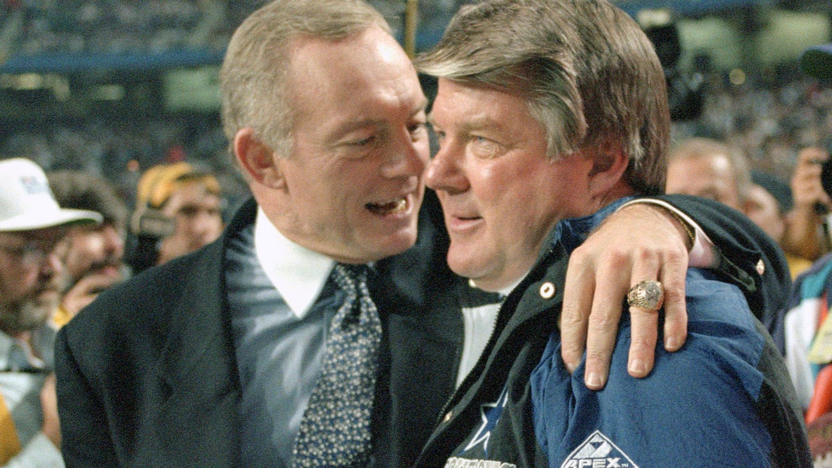 Owner Jerry Jones hugging head coach Jimmy Johnson at the Georgia Dome in Atlanta