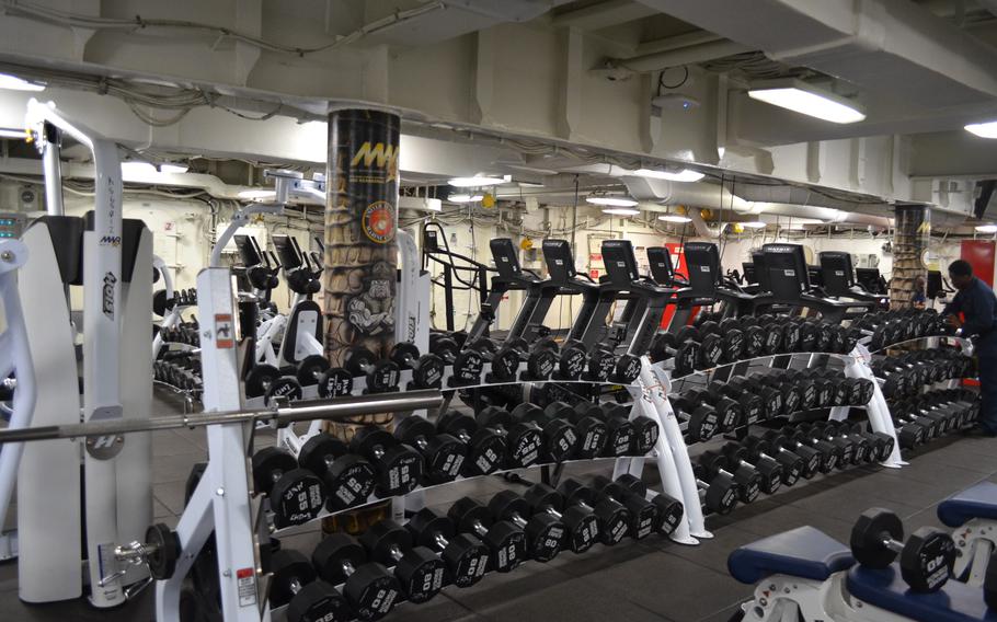 Weights and weight machines in the gym.
