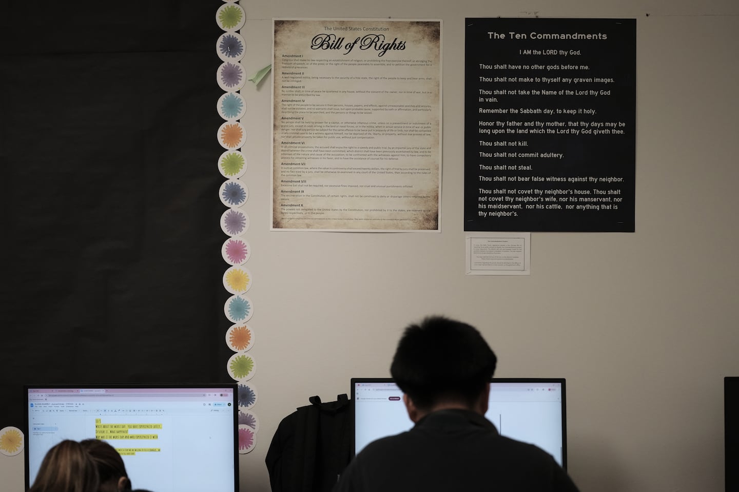 Students worked under posters of the Ten Commandments and Bill of Rights in a classroom at Lehman High School in Kyle, Texas, on Oct. 16.