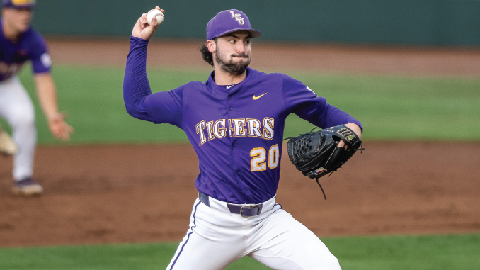 LSUBaseballVTexasAM041726_CasanEvans_MBacigalupi Right-handed baseball pitcher in a purple Tigers uniform (number 20) mid-pitch on the mound, glove on his left hand.