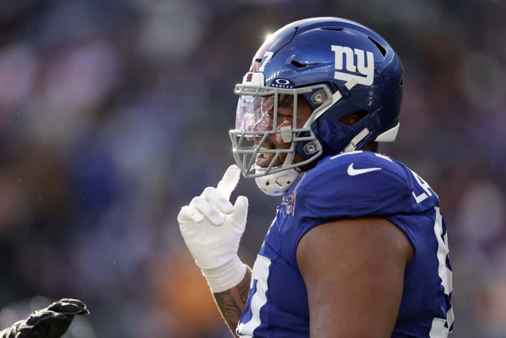 Dallas Cowboys Need to Go Full Madden Franchise Mode for Dexter Lawrence Close-up action photo of Dexter Lawrence in a New York Giants helmet and visor during an NFL game.