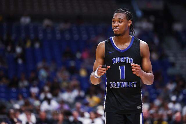 North Crowley forward Alex Barther II pumps his fists in celebration as the clock winds down in the Class 6A Division I state championship game against San Antonio Brennan on March 14 at the Alamodome in San Antonio.