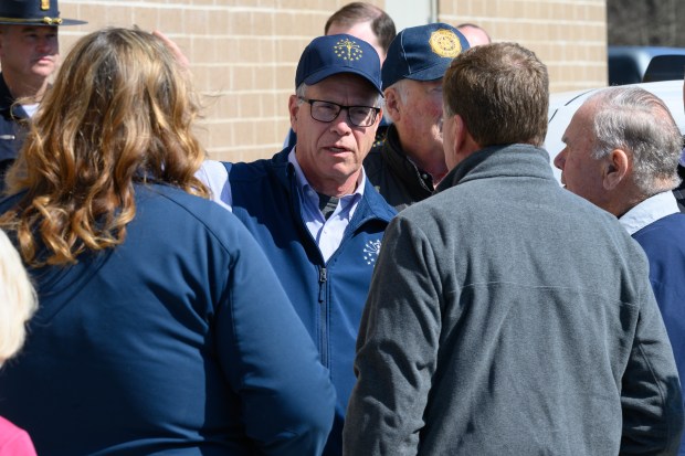 Governor Mike Braun speaks to local officials at the Emergency Operations Center in Lake Village during a tour of the tornado-damaged area on Thursday, March 12, 2026. (Kyle Telechan/for the Post-Tribune)