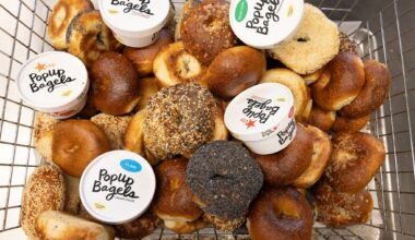 a basket of bagels and schmear from PopUp bagels