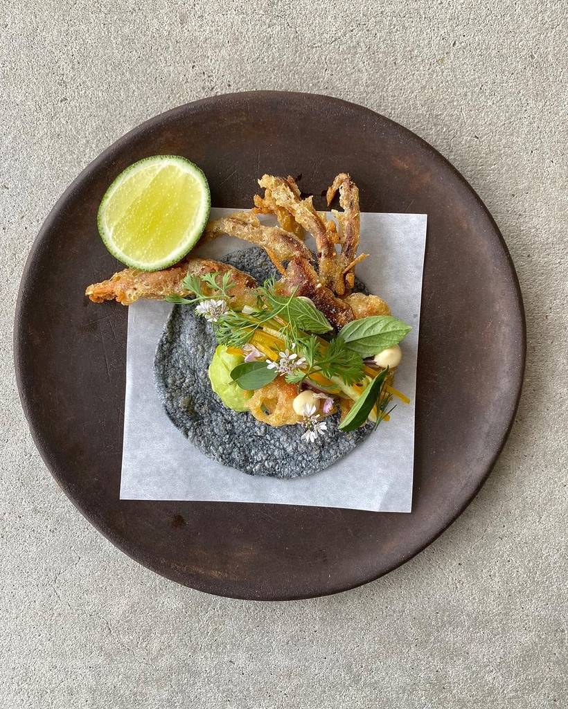 Image shows a plate of soft shell crab at Tatemo Michelin restaurant in Houston.