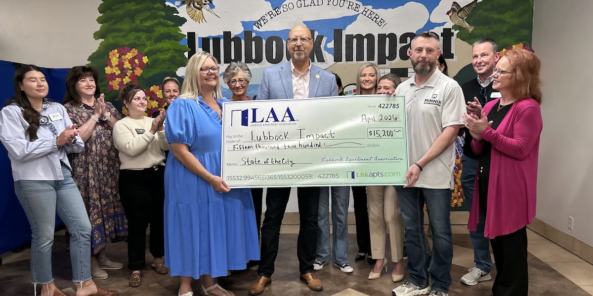 Lubbock Apartment Association presents $15,200 check to Lubbock Impact