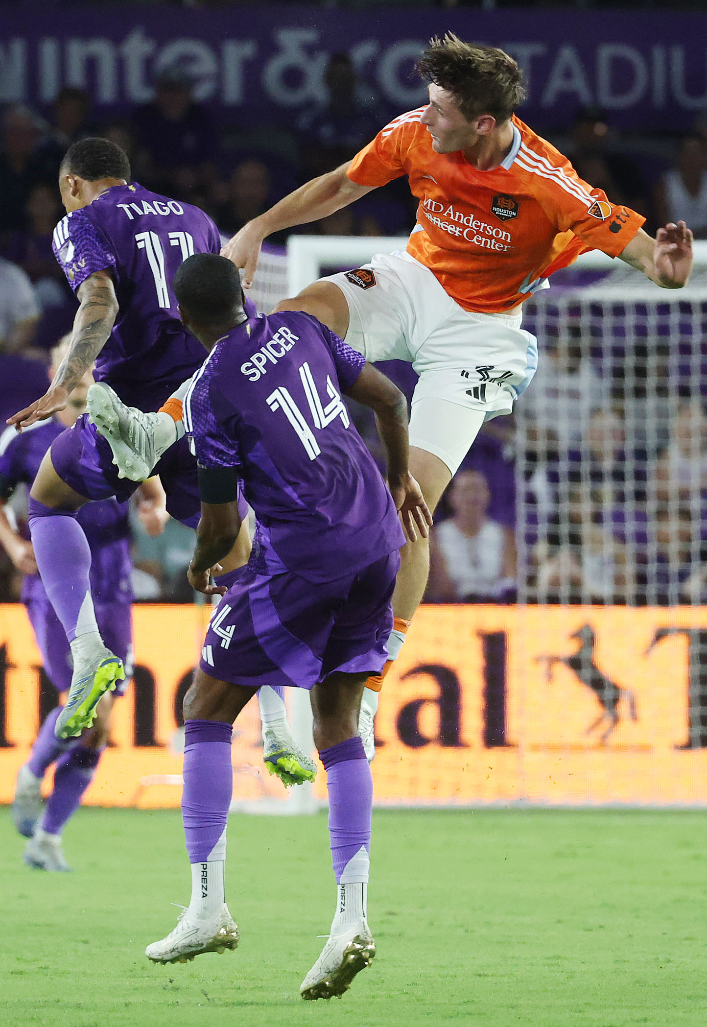 Houston player Augustin Resch (top) was issued a yellow card...
