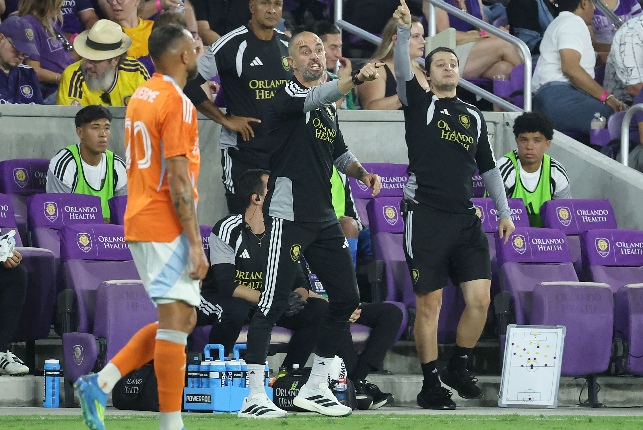 Orlando coach Martin Perelman (middle) coaches during the Houston Dynamo...