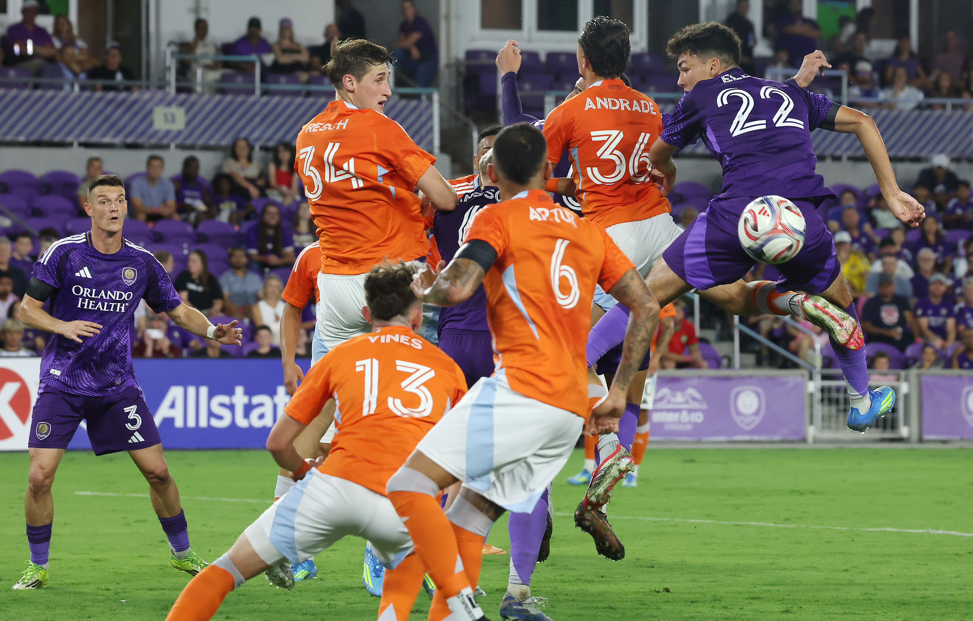 The ball hits the bottom of Orlando player Justin Ellis...