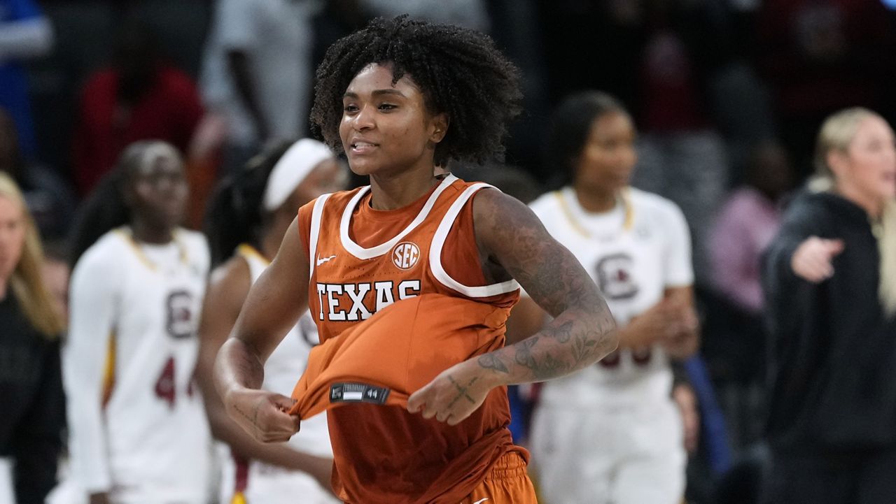 Texas guard Rori Harmon (3) celebrates the team's win over South Carolina in an NCAA college basketball game in the Players Era tournament in Las Vegas, Thursday, Nov. 27, 2025. (AP Photo/Eric Gay)