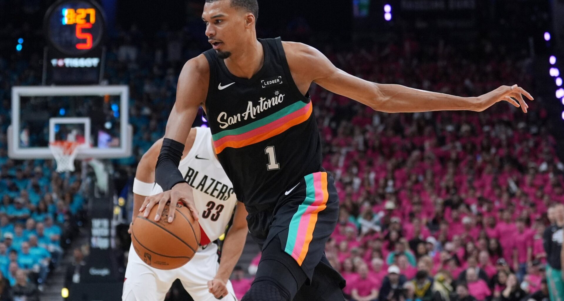 Wembanyama revels in safety of Hall of Famers, fans in playoff debut as Spurs top Blazers