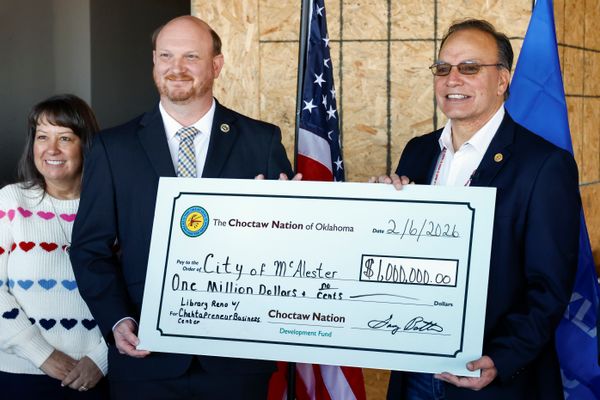 Gary Batton (right), chief of the Choctaw Nation of Oklahoma, presented a check for $1 million dollars to McAlester Mayor Justin Few in February for the renovation of the city library in  McAlester, Okla.