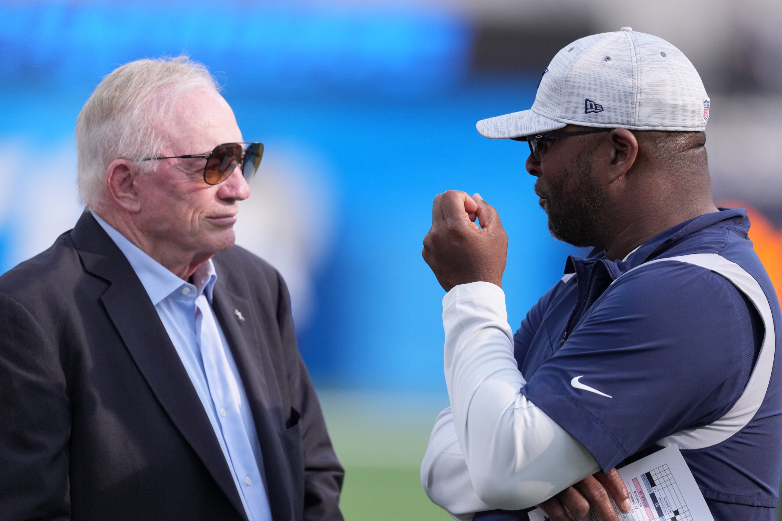 Aug 20, 2022; Inglewood, California, USA; Dallas Cowboys owner Jerry Jones (left) talks with vice president of player personnel Will McClay before the game against the Los Angeles Chargers at SoFi Stadium.