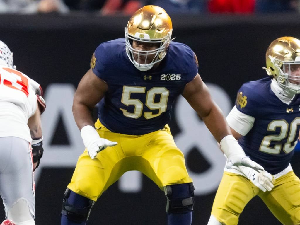 Jan 20, 2025; Atlanta, GA, USA; Notre Dame Fighting Irish offensive lineman Aamil Wagner (59) against the Ohio State Buckeyes during the CFP National Championship college football game at Mercedes-Benz Stadium. Mandatory Credit: Mark J. Rebilas-Imagn Images
