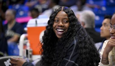 Aug 27, 2025; Arlington, Texas, USA; Dallas Wings guard Arike Ogunbowale (24) looks on from the team bench during the first half against the Connecticut Sun at College Park Center.