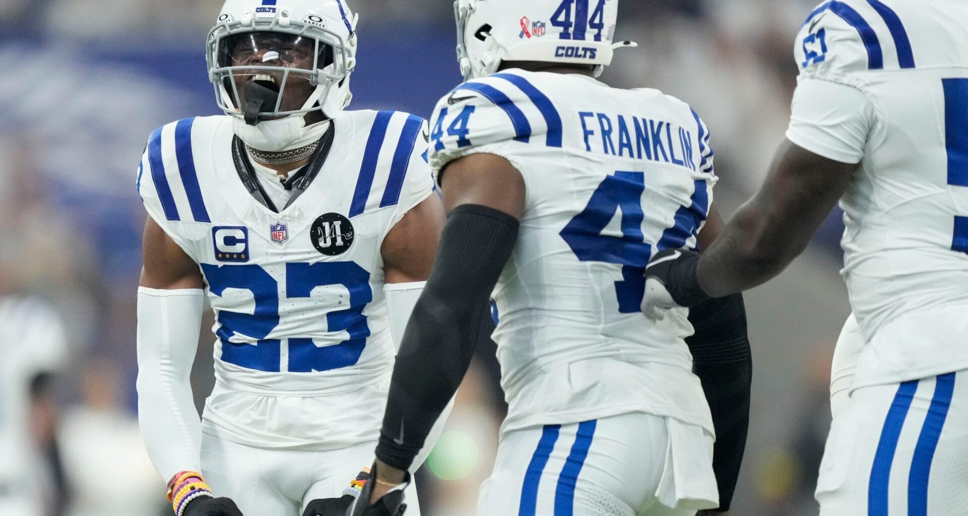 Indianapolis Colts cornerback Kenny Moore II (23) reacts after taking down Denver Broncos wide receiver Troy Franklin (11) on Sunday, Sept. 14, 2025, during a game at Lucas Oil Stadium in Indianapolis.