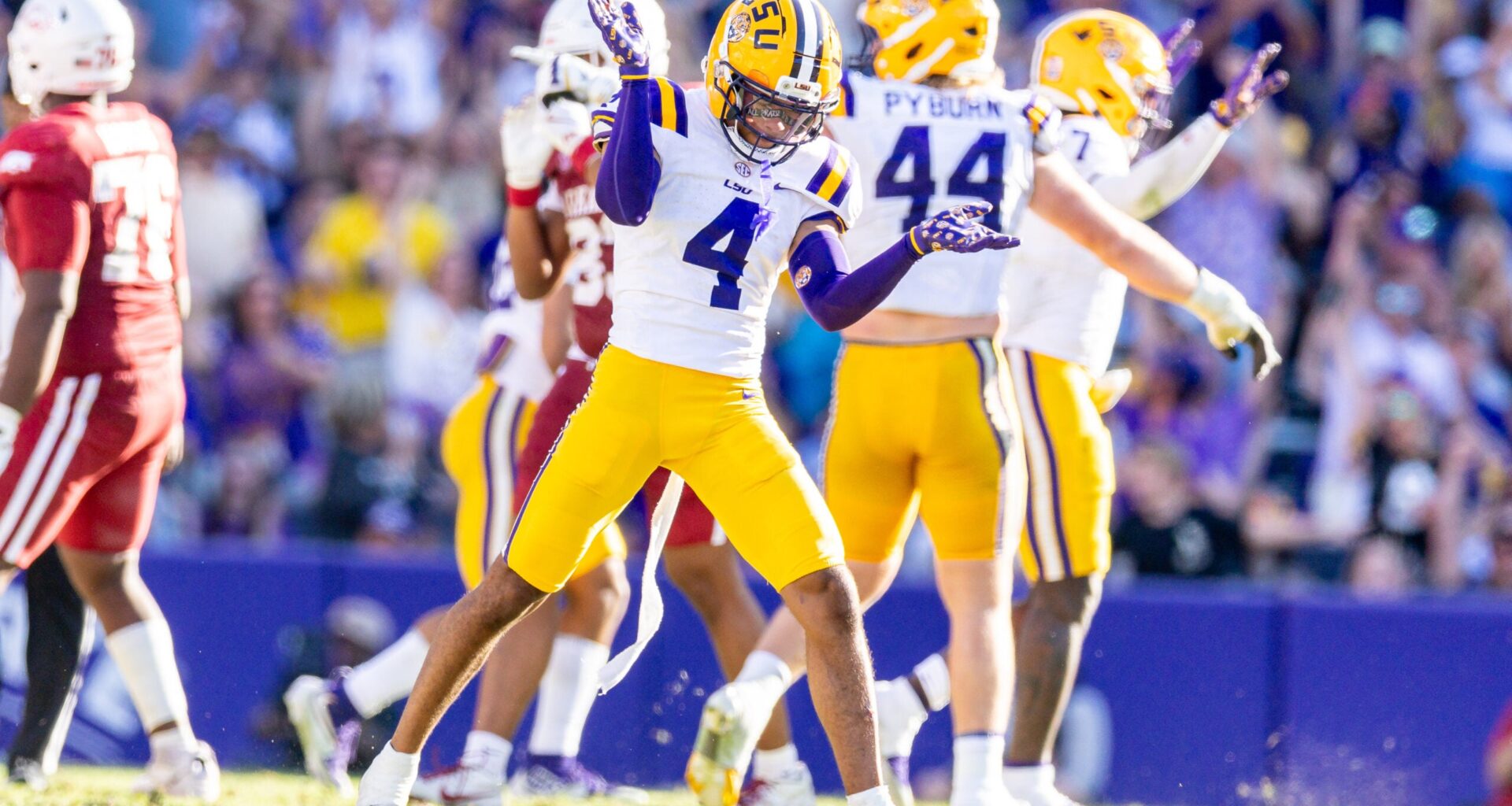 Nov 15, 2025; Baton Rouge, Louisiana, USA; LSU Tigers cornerback Mansoor Delane (4) reacts to a stop on fourth down against the Arkansas Razorbacks during the second half at Tiger Stadium.