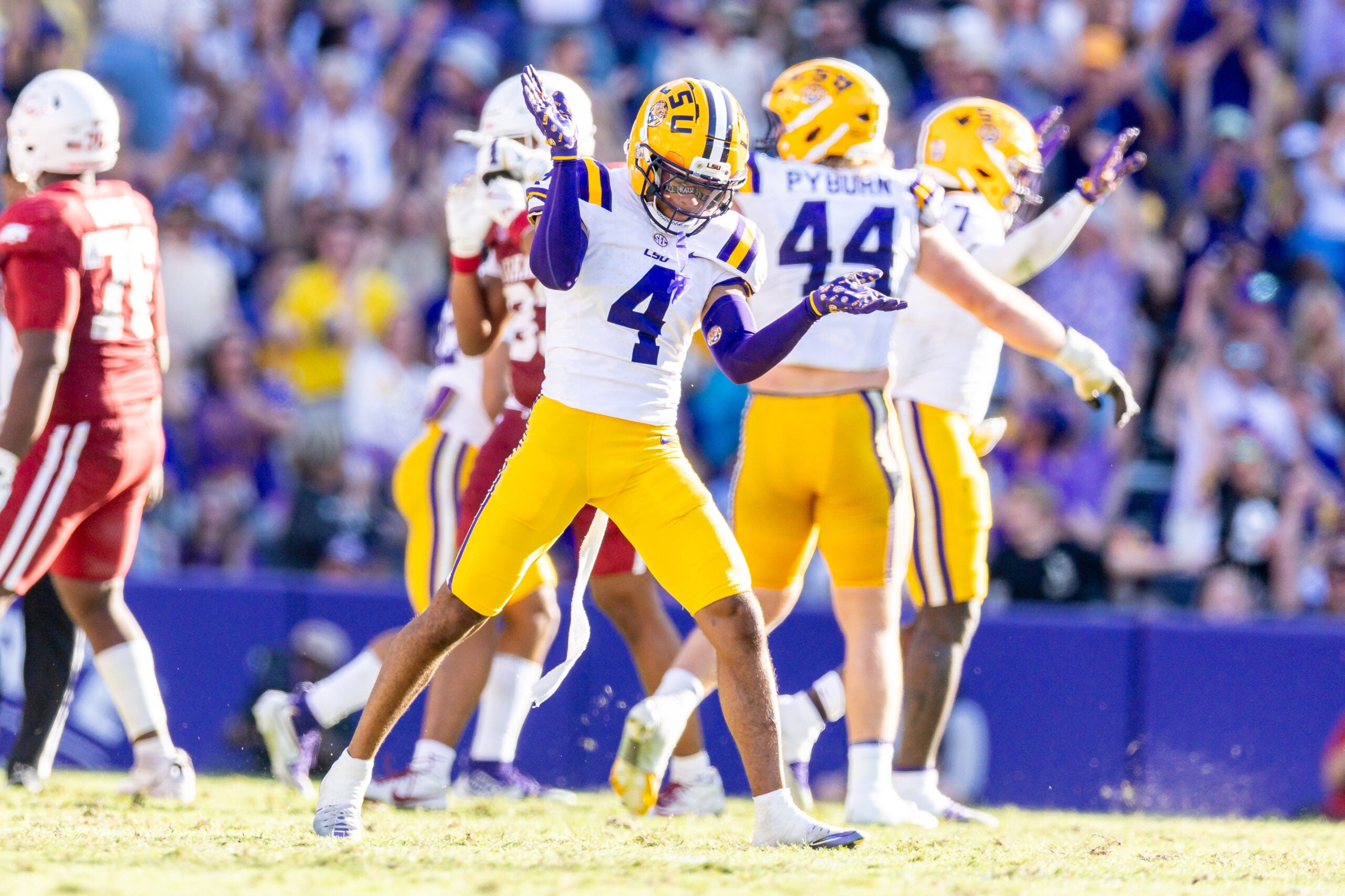 Nov 15, 2025; Baton Rouge, Louisiana, USA; LSU Tigers cornerback Mansoor Delane (4) reacts to a stop on fourth down against the Arkansas Razorbacks during the second half at Tiger Stadium.
