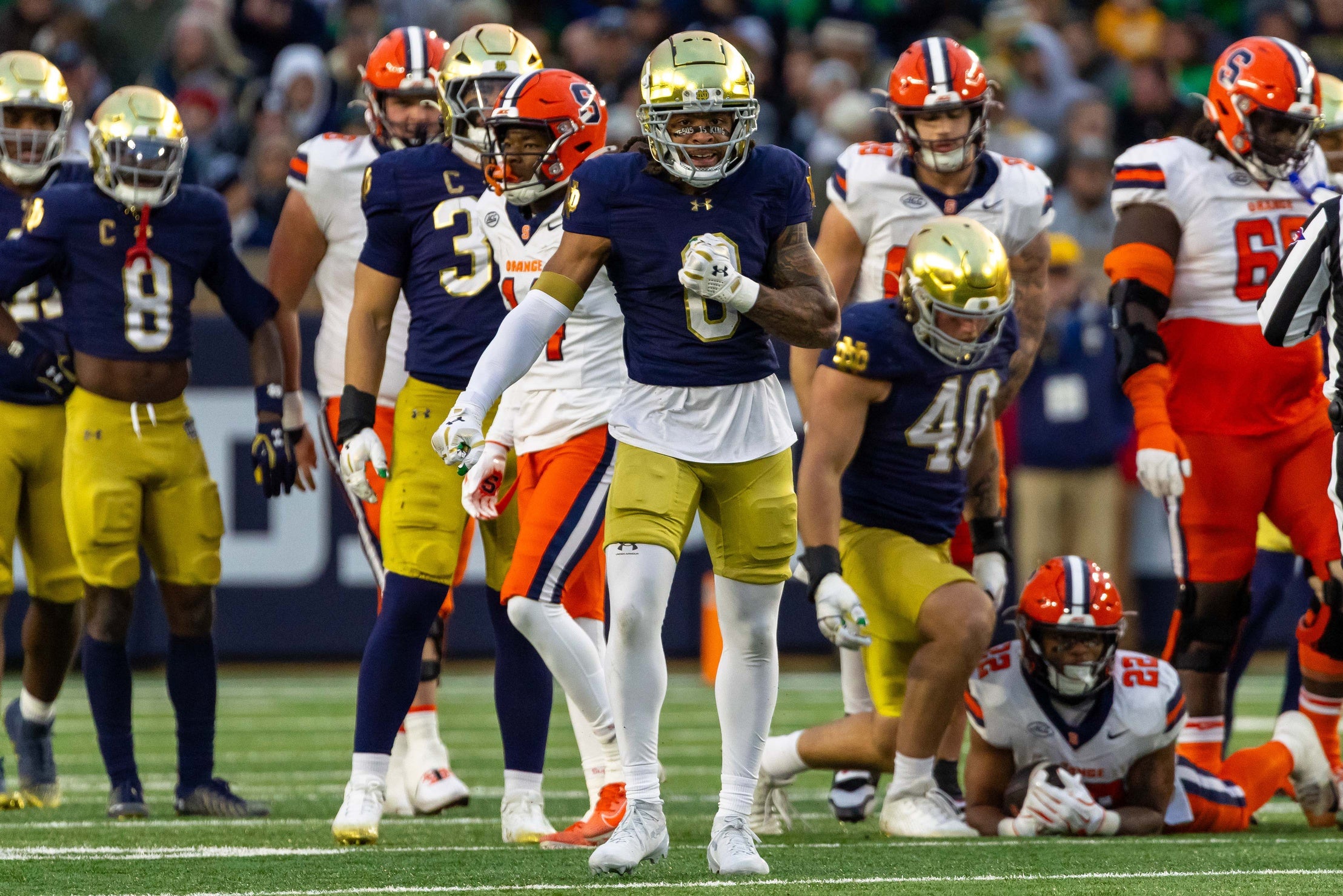 Nov 22, 2025; South Bend, Indiana, USA; Notre Dame Fighting Irish defensive back Devonta Smith (0) celebrates a stop against the Syracuse Orange during the first half at Notre Dame Stadium. Mandatory Credit: Michael Caterina-Imagn Images