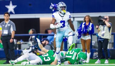 Nov 23, 2025; Arlington, Texas, USA; Dallas Cowboys wide receiver George Pickens (3) reacts after making a catch over Philadelphia Eagles cornerback Cooper DeJean (33) and Philadelphia Eagles safety Sydney Brown (21) during the game at AT&T Stadium.