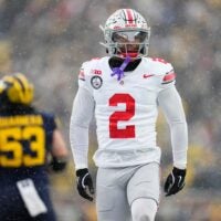 Ohio State Buckeyes defensive back Caleb Downs (2) celebrates during the NCAA football game against the Michigan Wolverines at Michigan Stadium in Ann Arbor, Mich. on Nov. 29, 2025. Ohio State won 27-9.