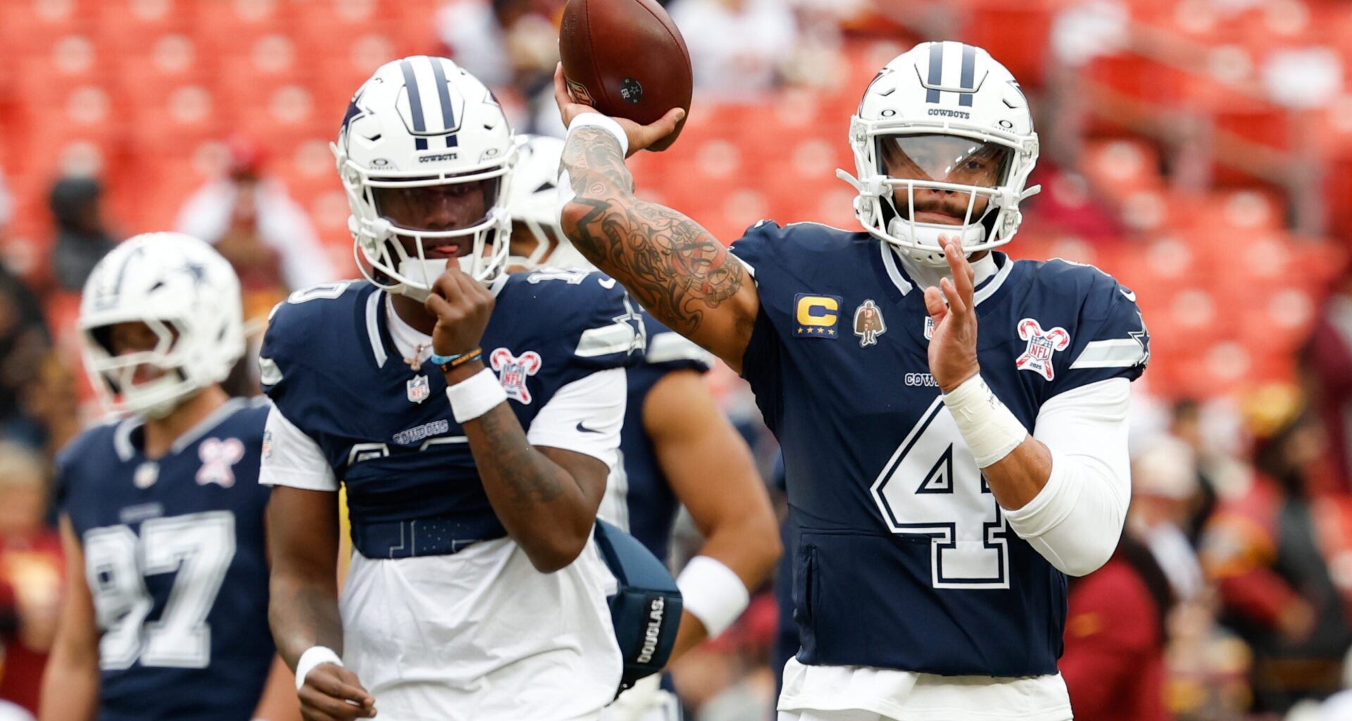 Dec 25, 2025; Landover, Maryland, USA; Dallas Cowboys quarterback Dak Prescott (4) warms up before the game against the Washington Commanders at Northwest Stadium.