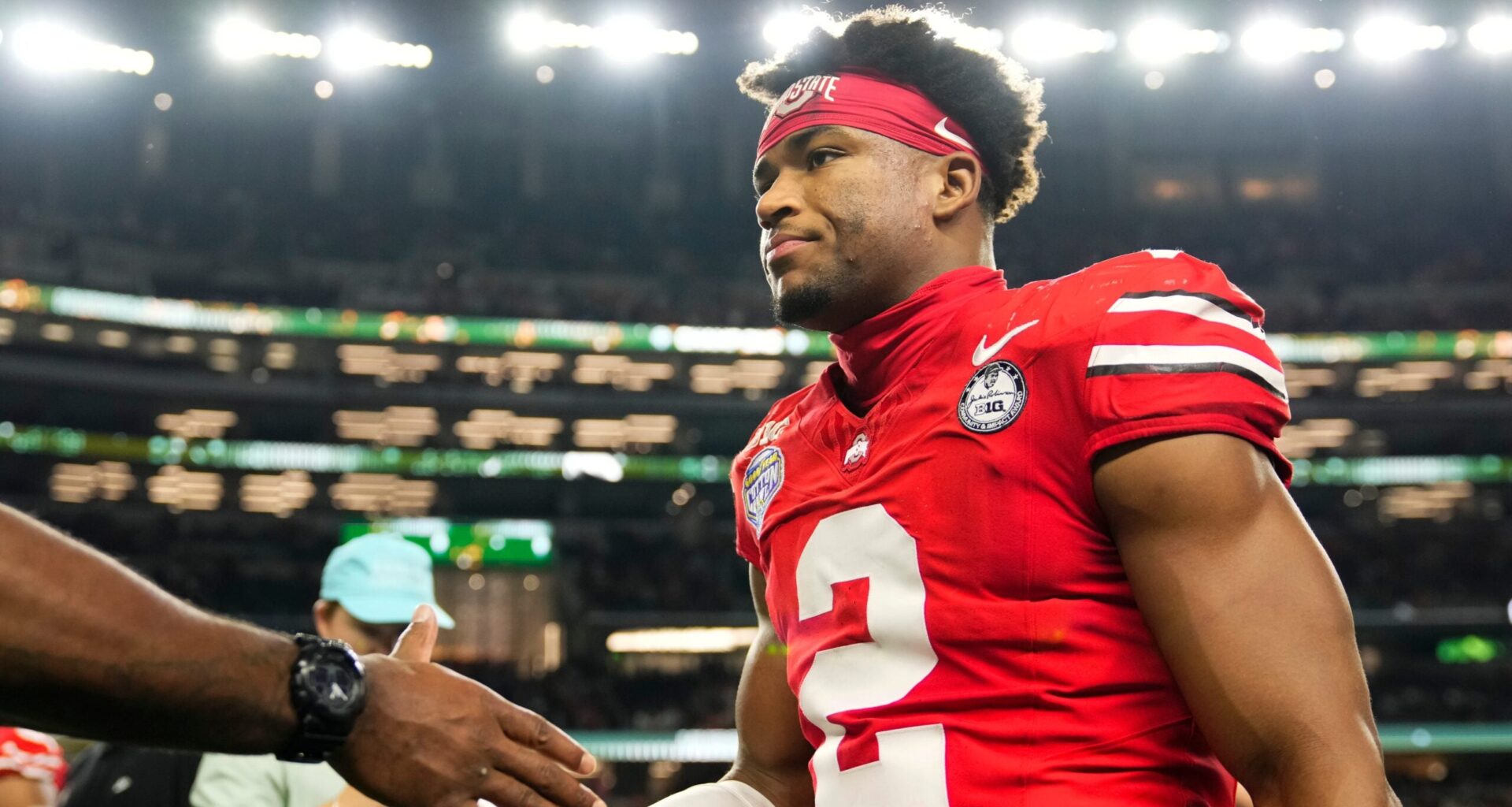 Ohio State Buckeyes defensive back Caleb Downs (2) leaves the field following the Cotton Bowl at AT&T Stadium in Arlington, Texas for the College Football Playoff quarterfinal game against the Miami Hurricanes on Dec. 31, 2025. Ohio State lost 24-14.