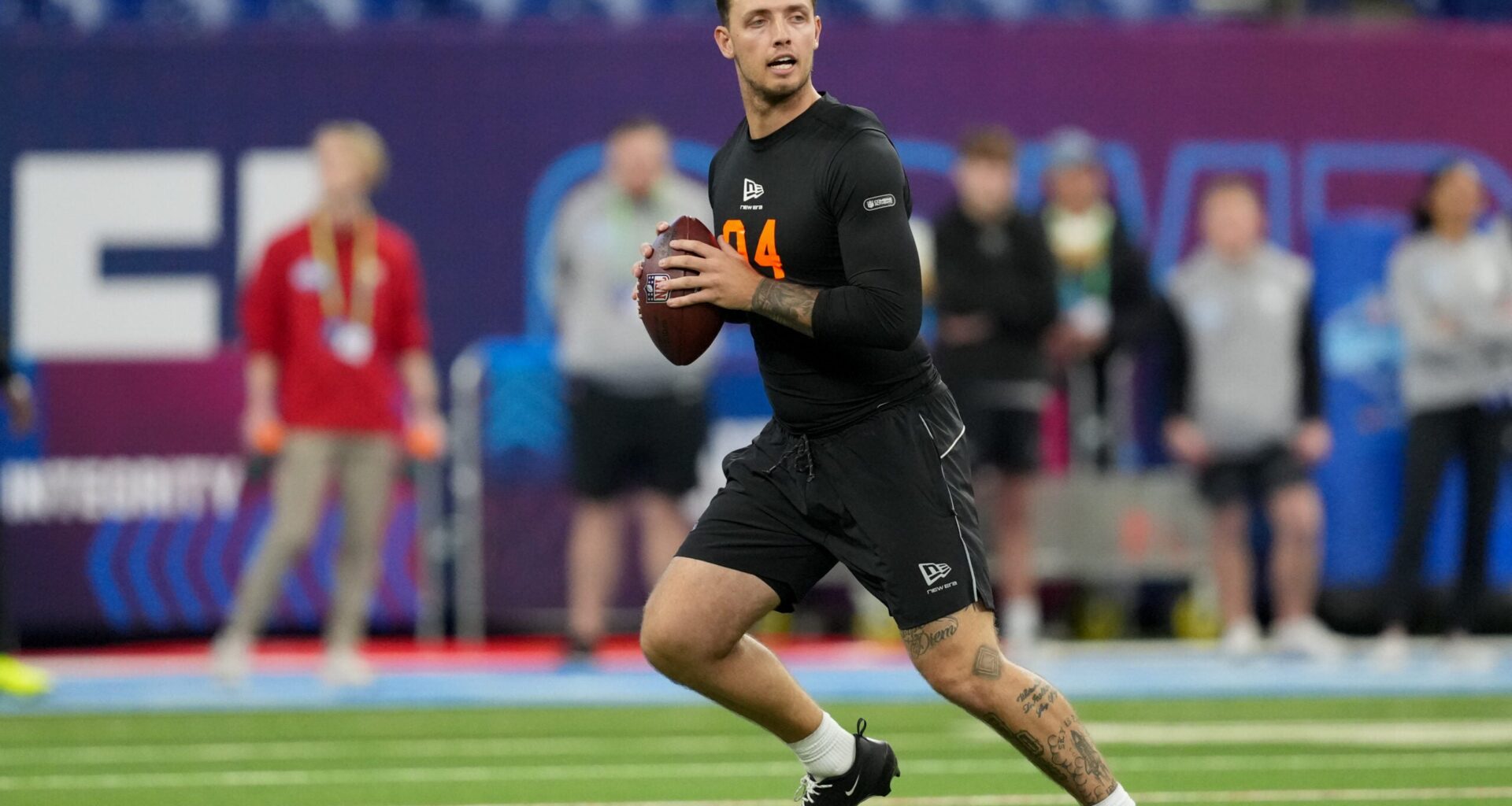 Feb 28, 2026; Indianapolis, IN, USA; Miami quarterback Carson Beck (QB04) during the NFL Scouting Combine at Lucas Oil Stadium.