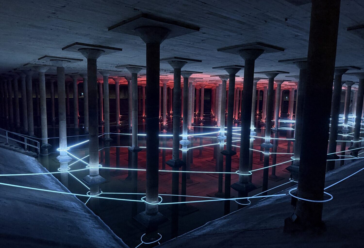 Red and white LED lights connect a network of pillars underground