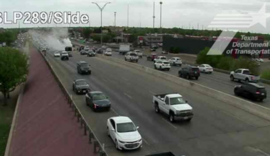 Rollover on South Loop and Slide Rd. causing traffic delays