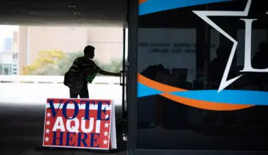 A voter enters a polling location at the Lyndon B. Johnson Presidential Library and Museum during the last day of early voting in Austin, Texas on Nov. 7, 2022.