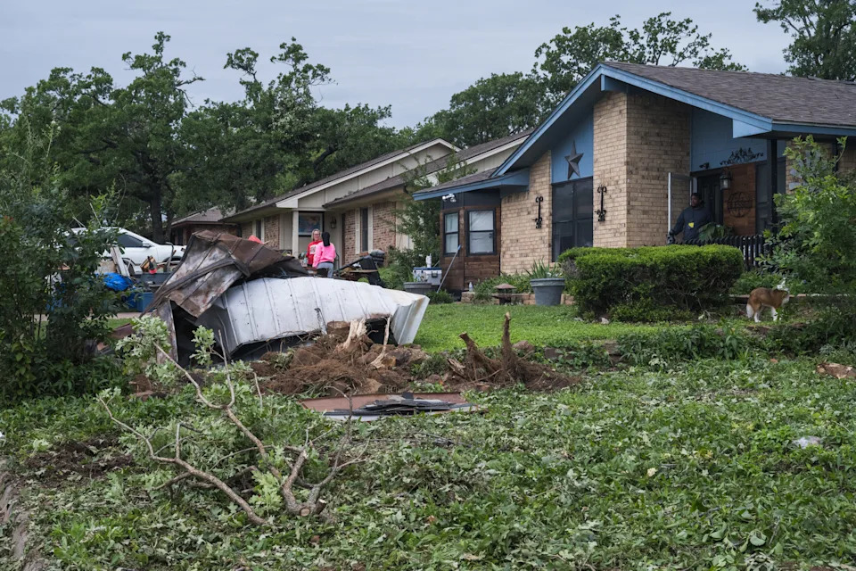MINERAL WELLS, TEXAS - APRIL 29: Debris sits in a yard after a tornado passed through town on April 29, 2026 in Mineral Wells, Texas. Six days of severe storms have caused extensive damage and multiple injuries across the midwest and southern U.S.