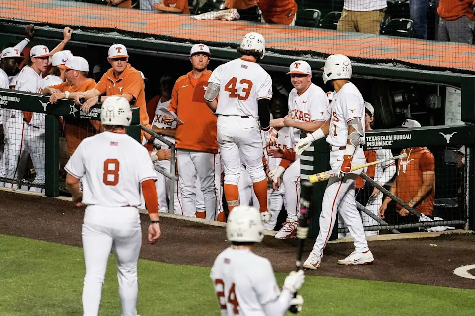 Texas Longhorns outfielder Aiden Robbins (43) is welcomed back to the dugout after a home run in the fifth inning as the Texas Longhorns play the USC Upstate Spartans on Friday, March 6, 2026 at UFCU-Disch Falk Field in the first game of a three-game series. (Sara Diggins/Austin American-Statesman)