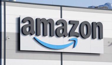 An Amazon company logo is seen on the facade of a company's building in Schoenefeld near Berlin, Germany, on March 18, 2022. (AP Photo/Michael Sohn, File)