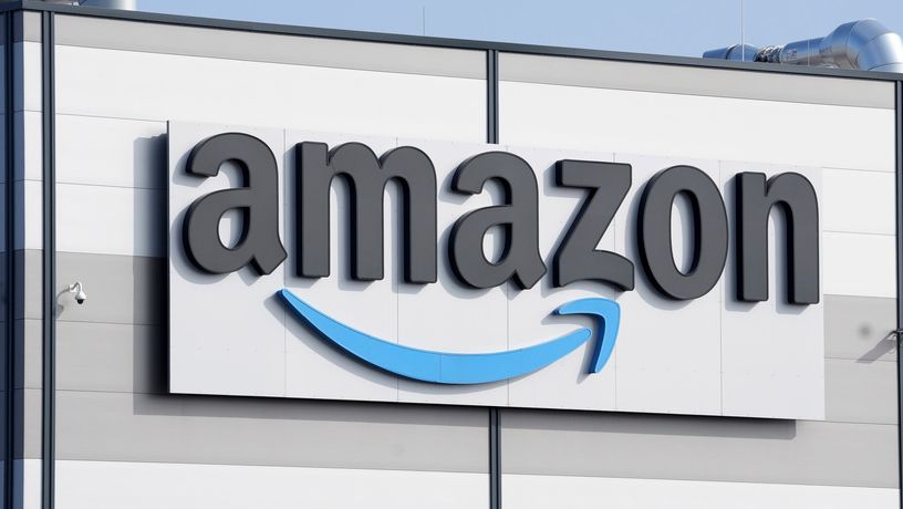 An Amazon company logo is seen on the facade of a company's building in Schoenefeld near Berlin, Germany, on March 18, 2022. (AP Photo/Michael Sohn, File)