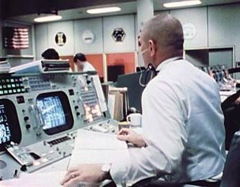 Apollo 13 Flight Director Gene Kranz surveys the MOCR after the accident