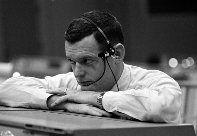 Apollo 13 Flight Director Glynn Lunney looking concerned as he thinks