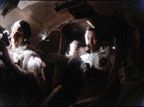 apollo_13_lovell_swigert_eating_in_lm