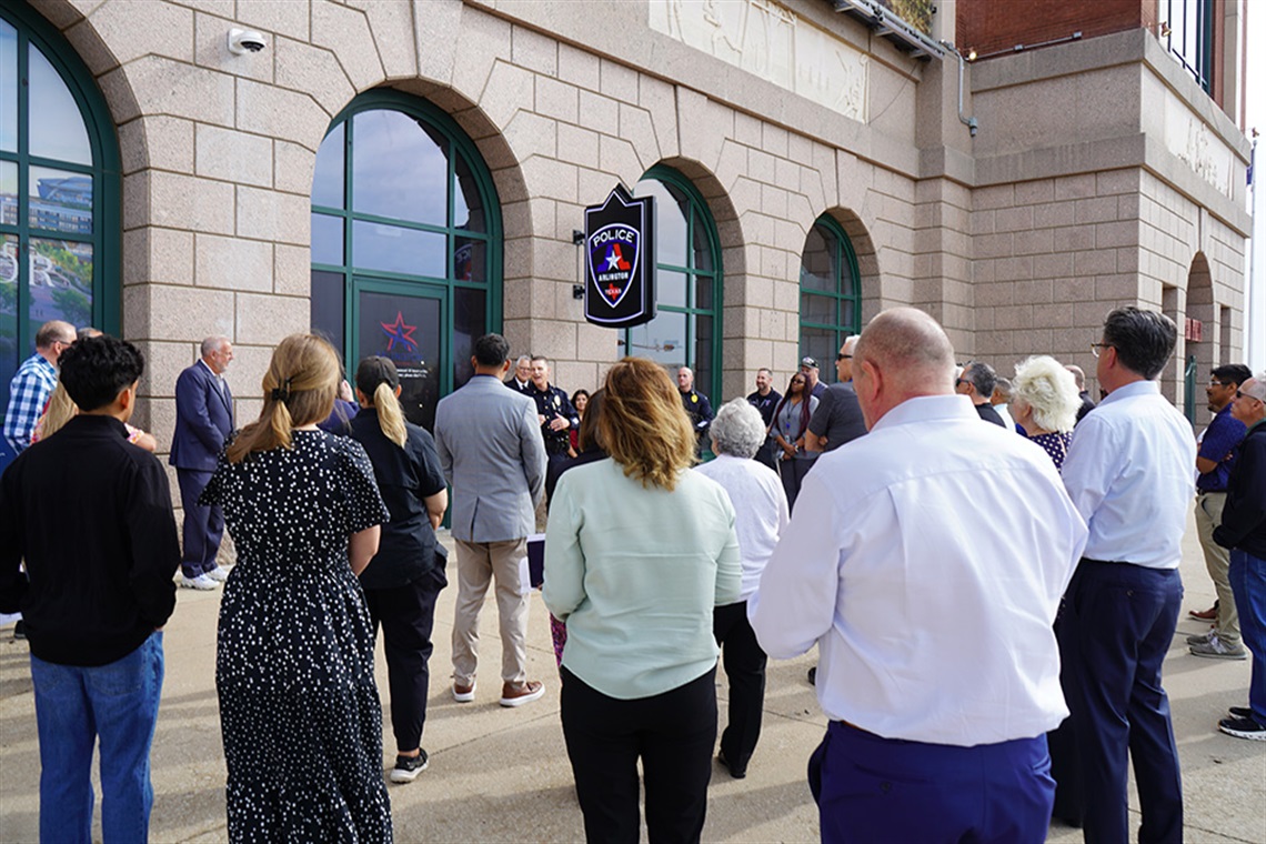 A crowd gathered in front of the new APD Entertainment District storefront