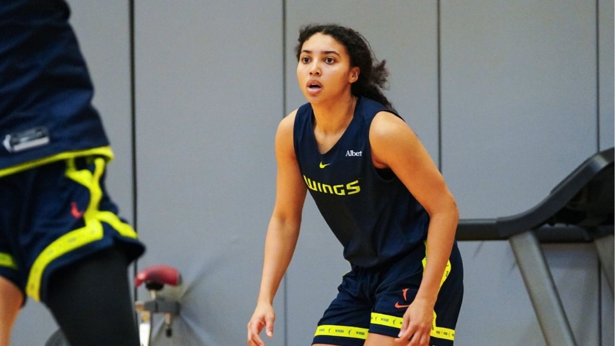 Dallas Wings guard Azzi Fudd participates in drills during the team's first training camp practice at College Park Center in Arlington.