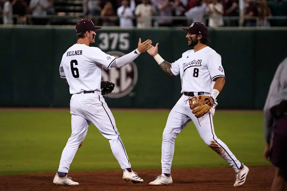 Texas A&M infielders Boston Kellner (6) and Chris Hacopian (8) celebrate beating the Texas Longhorns in game one of the Lone Star Showdown at Blue Bell Park on Friday, April 10, 2026 in College Station, Texas. (Aaron E. Martinez/Austin American-Statesman)